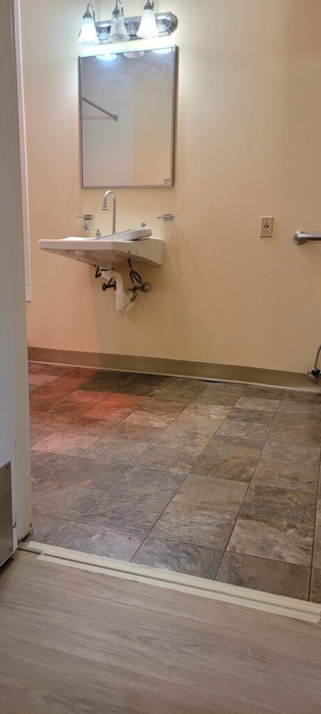 Sheet vinyl flooring installation in Massachusetts kitchen